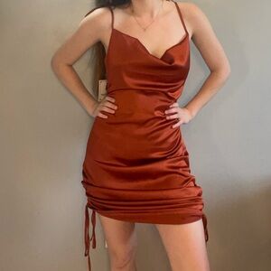 NWT burnt orange silky clowl neck ruched mini dress.
